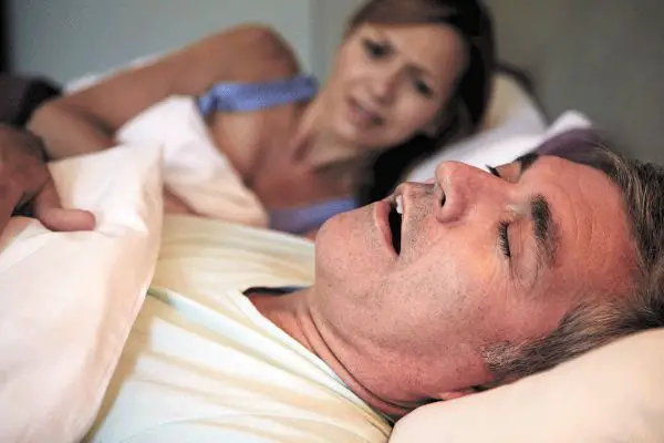How to Deal with a Snoring Partner: Strategies for a Restful Night